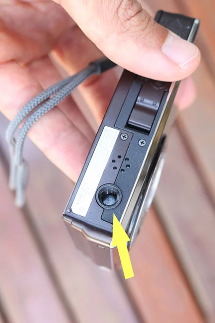 Encaixe de tripé para câmera compacta